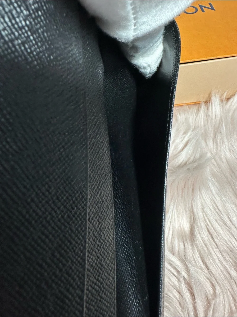 Louis Vuitton bifold wallet in Taiga Leather